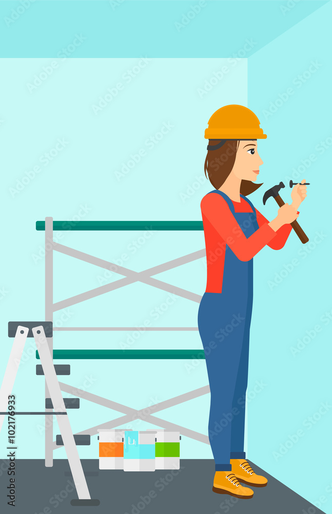 Constructor hammering nail. Constructor hammering nail.
