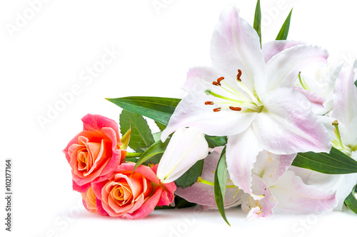 White-pink lilies and three red-orange roses isolated on white background