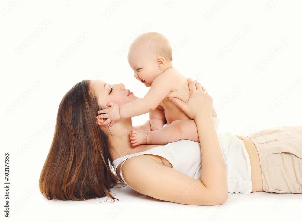 Happy mother playing with little baby on a white background Happy mother playing with little baby on a white background