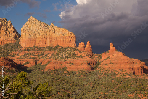 Ship Rock, a landmark sandstone cliff in Sedona, Arizona, on a cloudy afternoon. © EdgeofReason
