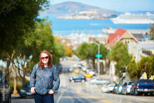 Photography Happy young woman on a street of Can Francisco
