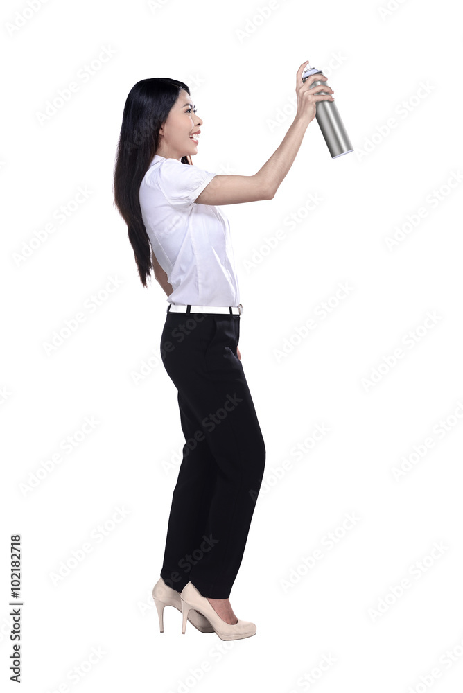 Asian business woman spraying something