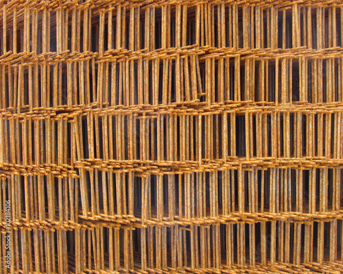 rusty metal stacked grid on industrial construction site