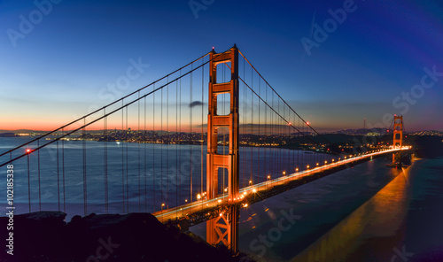Fototapeta Naklejka Na Ścianę i Meble -  Golden Gate Glow And Reflections