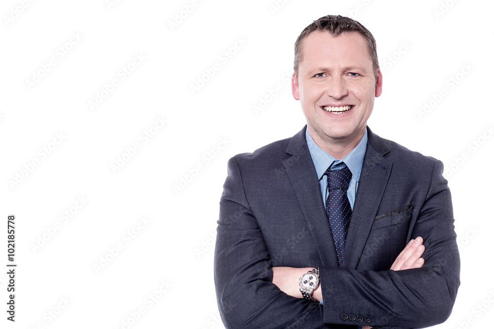 Smiling businessman, arms folded. Smiling businessman, arms folded.