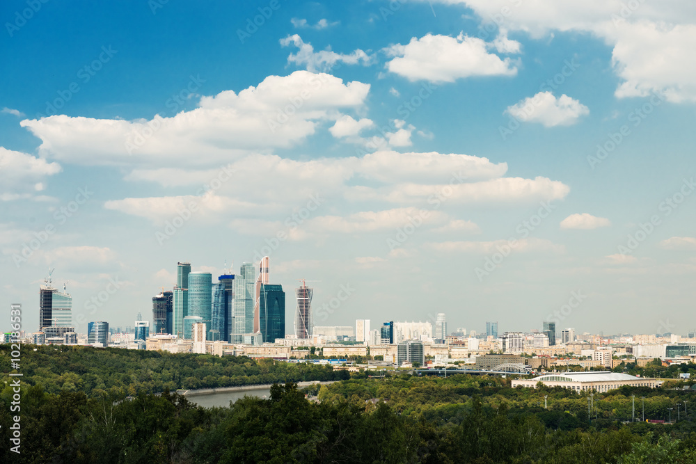 above view Moscow cityscape and blue clouds