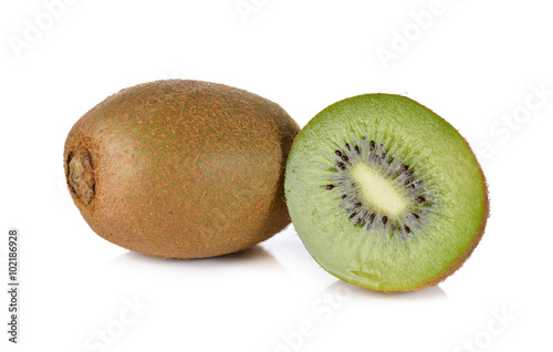 whole and half cut kiwi fruit on white background