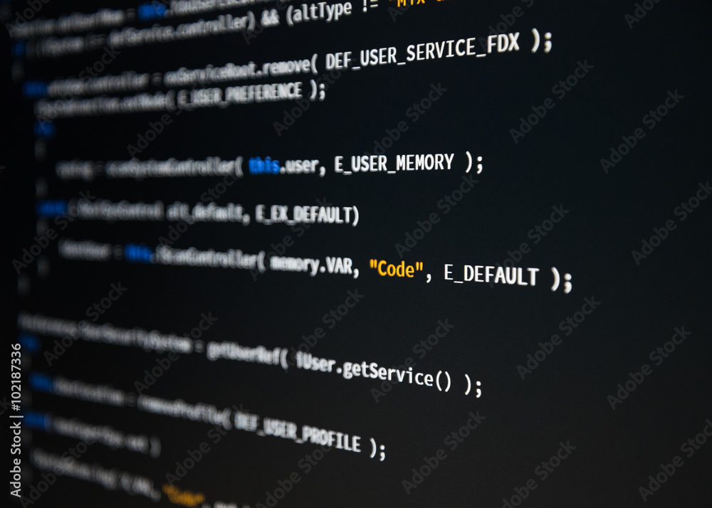 Software developer programming code. Abstract computer script code. Shallow depth of field, selective focus effect. Software developer programming code. Abstract computer script code. Shallow depth of field, selective focus effect.