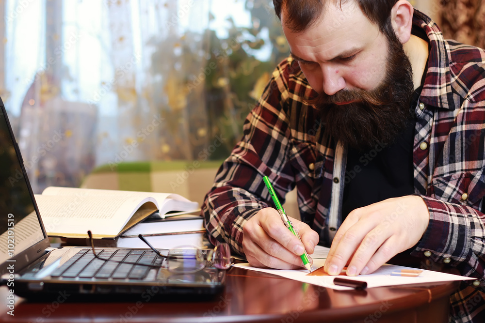 male notebook work bearded male notebook work bearded