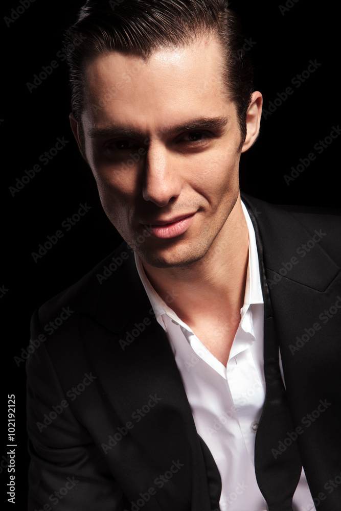 businessman with open shirt smiling in studio businessman with open shirt smiling in studio