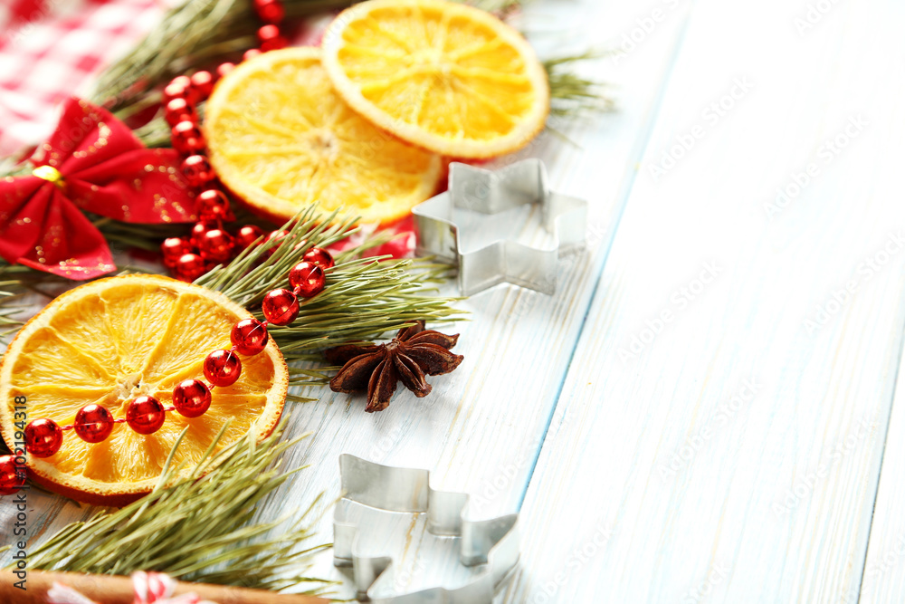 Christmas tree branch with dried oranges, cinnamon and anise sta Christmas tree branch with dried oranges, cinnamon and anise sta