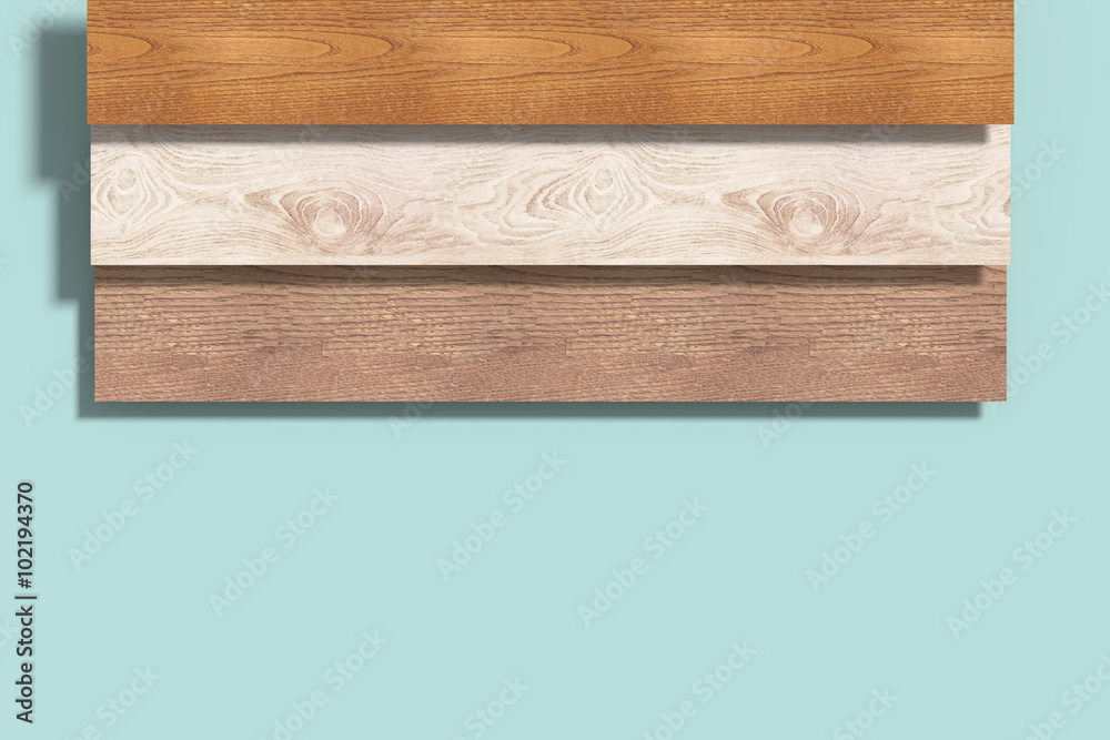 Three different wood planks on blue background