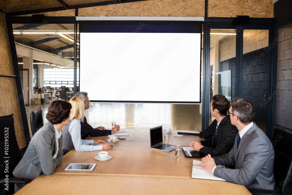 Business team using video chat during meeting Business team using video chat during meeting