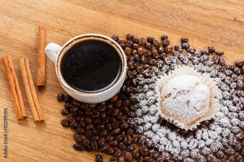 Sweet muffin and coffee. Ov...