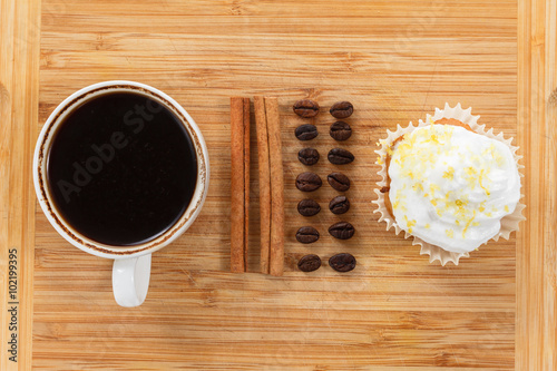 Sweet muffin and coffee. Ov...