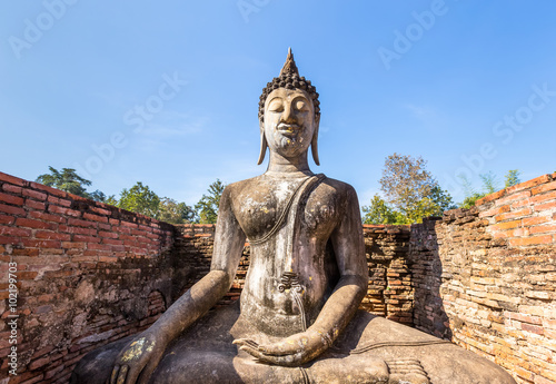 Buddha in small chapel at Wat Si Chum , Shukhothai Historical Pa