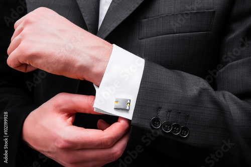 cuff links on a tie