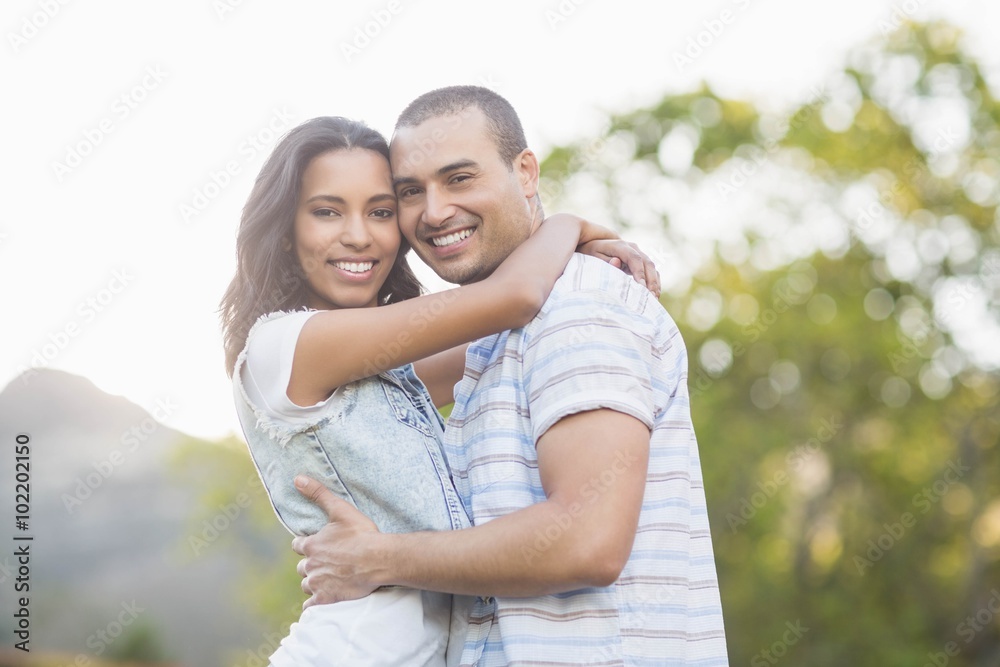 Happy young couple hugging Happy young couple hugging