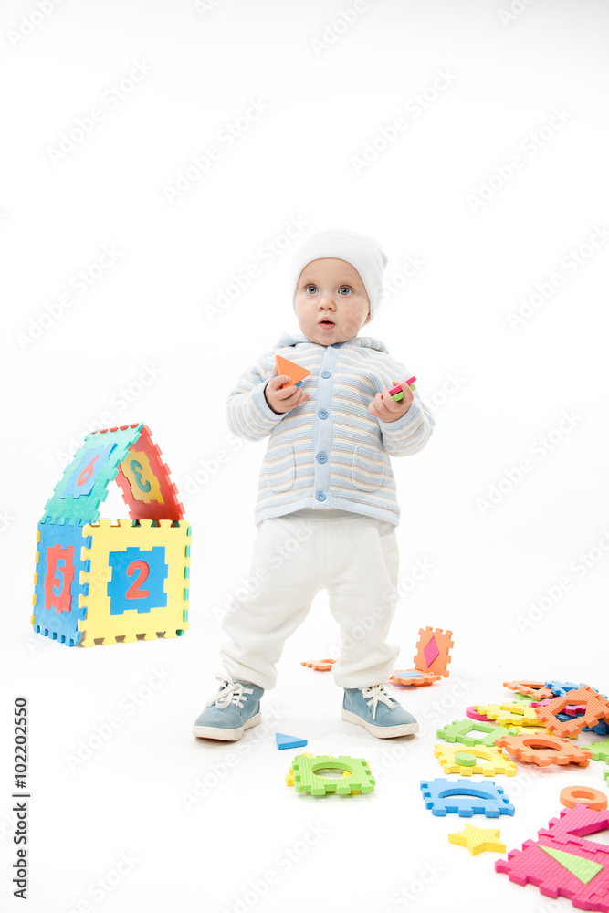 little child baby boy playing with puzzles little child baby boy playing with puzzles