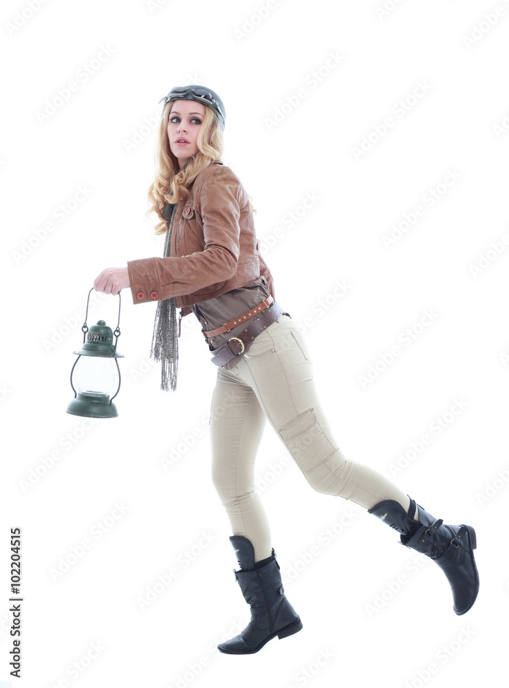 young blonde woman in a steampunk outfit, action hero pose. isolated on white background. young blonde woman in a steampunk outfit, action hero pose. isolated on white background.