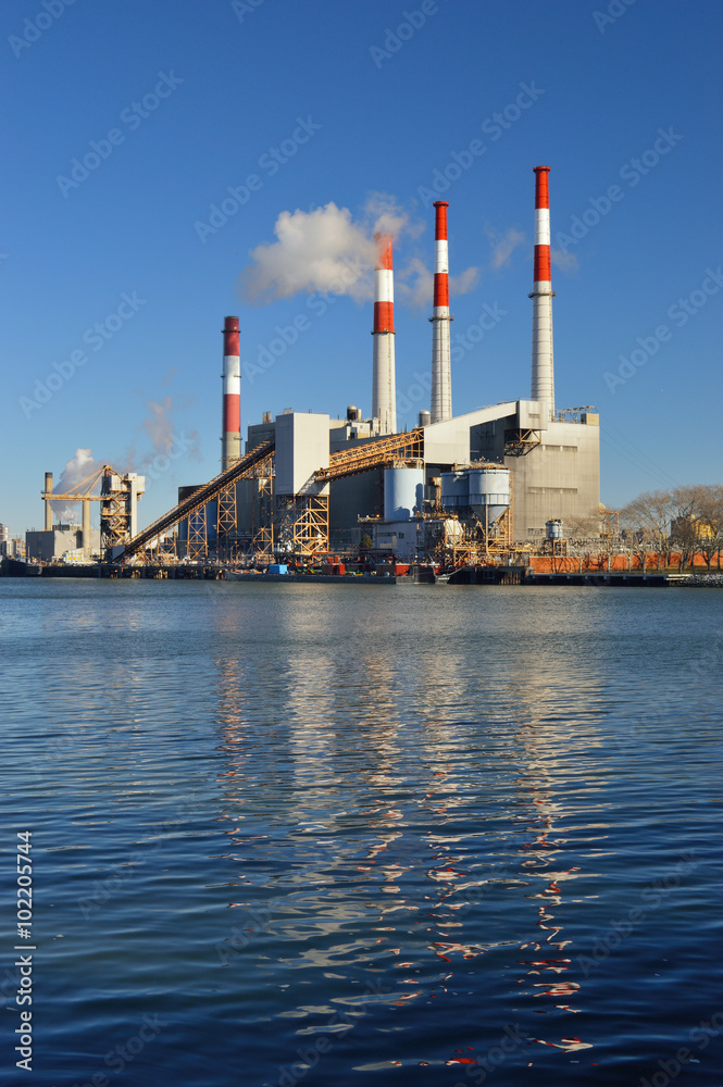 Smokestacks over a Ravenswood Generating Station. Smokestacks over a Ravenswood Generating Station.