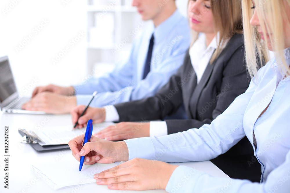 Group of business people working together in office Group of business people working together in office