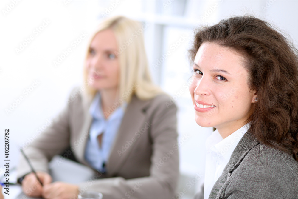A group of business people at meeting A group of business people at meeting