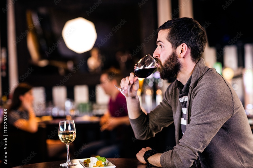 Man having a glass of wine Man having a glass of wine