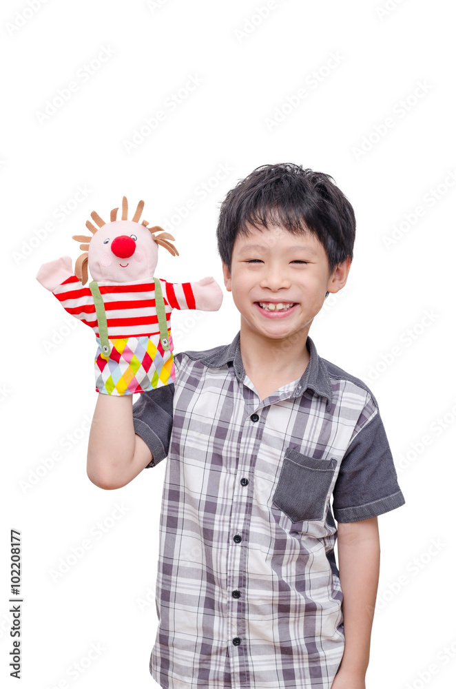 Young Asian boy playing with puppet Young Asian boy playing with puppet