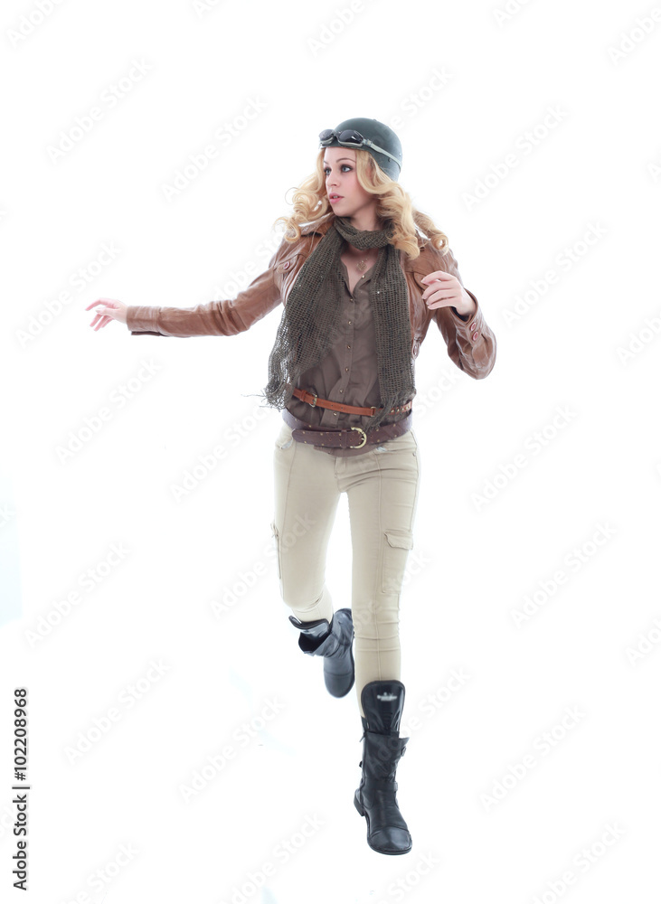 young blonde woman in a steampunk outfit, action hero pose. isolated on white background. young blonde woman in a steampunk outfit, action hero pose. isolated on white background.