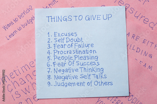 Sticky note with text things to give up