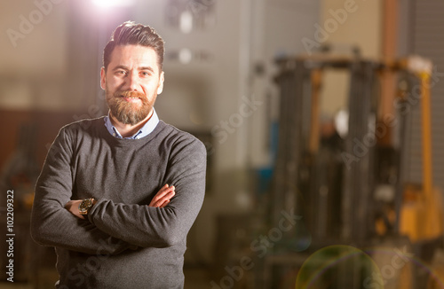 Businessman working in factory