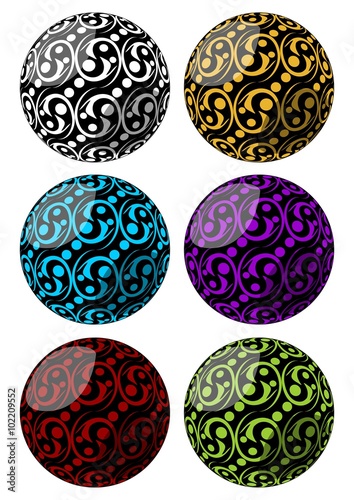 Set of spheres with swirly pattern decoration in different color variants