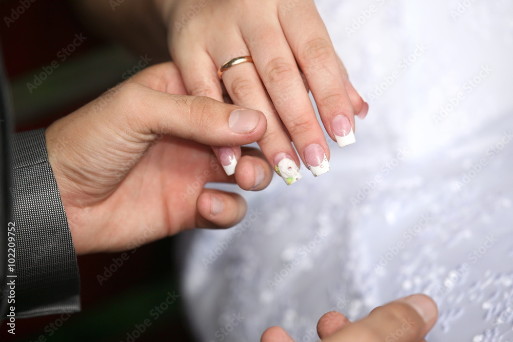 hands of the bride and groom together hands of the bride and groom together