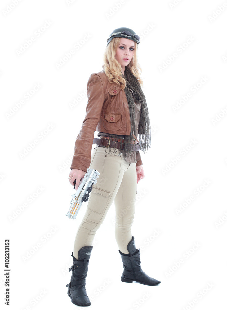 young blonde woman in a steampunk outfit, action hero pose. isolated on white background. young blonde woman in a steampunk outfit, action hero pose. isolated on white background.