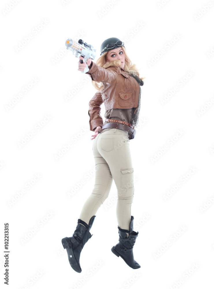 young blonde woman in a steampunk outfit, action hero pose. isolated on white background. young blonde woman in a steampunk outfit, action hero pose. isolated on white background.