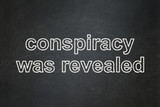 Politics concept: Conspiracy Was Revealed on chalkboard background
