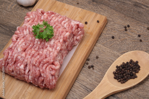 Raw minced meat with pepper, garlic