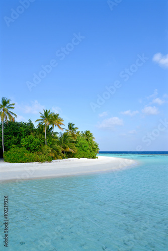 Remote island with white sand and turquoise sea, Maldives