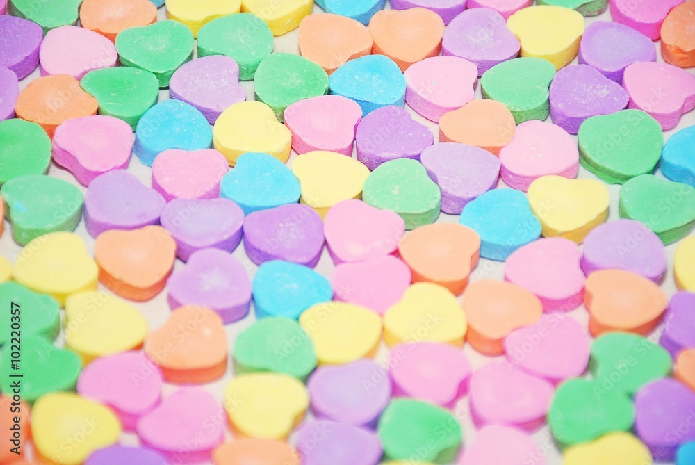 Selective focus of a candy heart background Selective focus of a candy heart background
