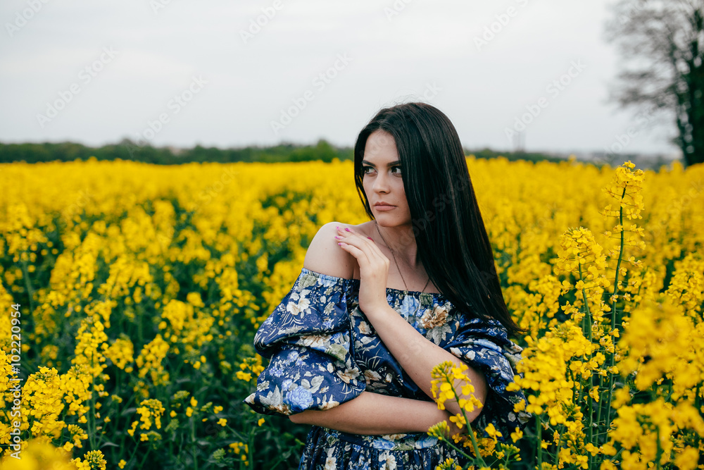 Spring walk girl in a beautiful cherry orchard Spring walk girl in a beautiful cherry orchard