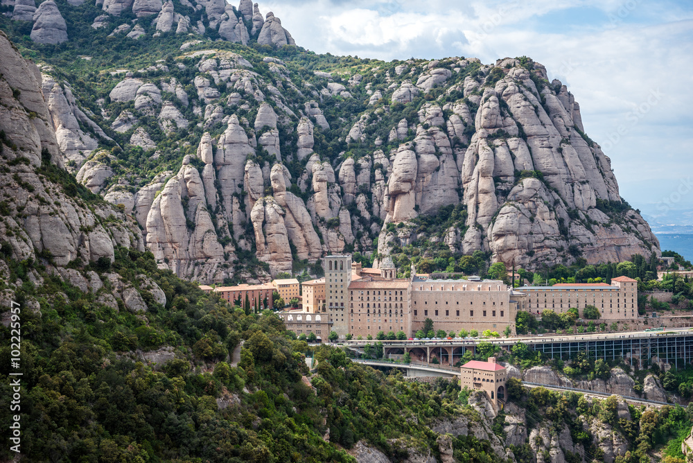 Aerial view on Santa Maria de Montserrat Abbey in Montserrat mountains, Spain - obrazy, fototapety, plakaty 