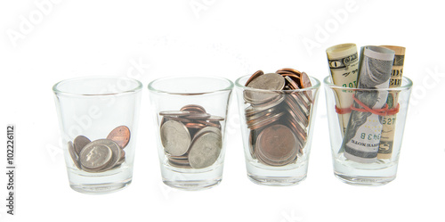 Glass jars with coins like diagram, - savings concept