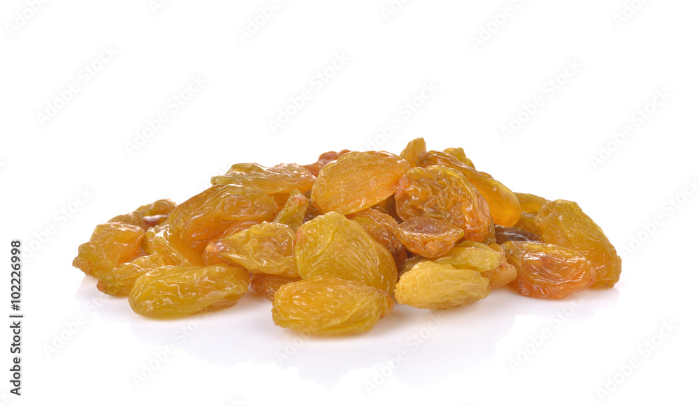 yellow raisins on white background yellow raisins on white background