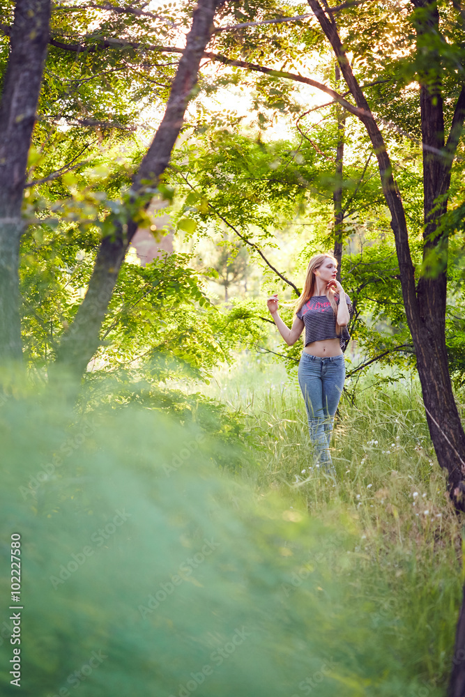 Girl walking in forest Girl walking in forest