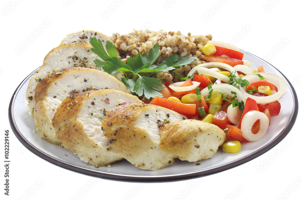 Chicken breast, buckwheat and salad with paprika, onions and corn