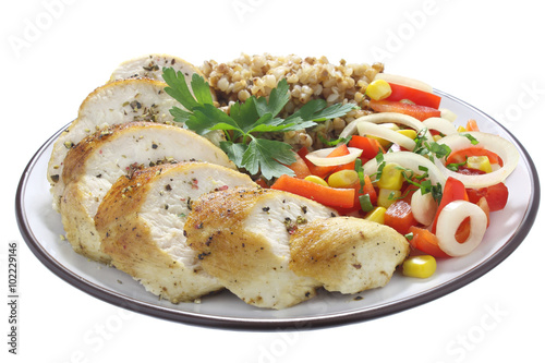 Chicken breast, buckwheat and salad with paprika, onions and corn