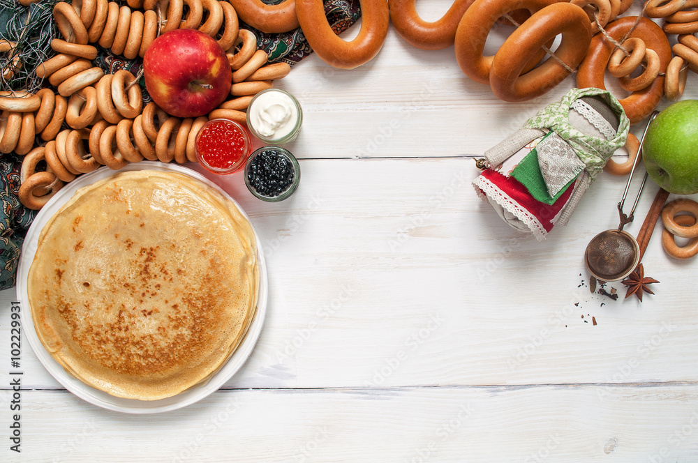 Maslenitsa festival meal. Pancake with caviar and tea Maslenitsa festival meal. Pancake with caviar and tea