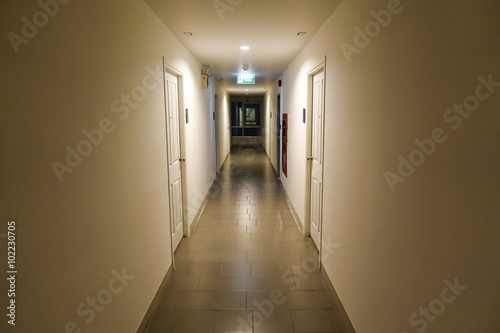 warm corridor in the hotel with old carpet