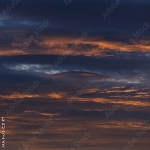 sunset sky dramatic background, colorful twilight sky © sutichak